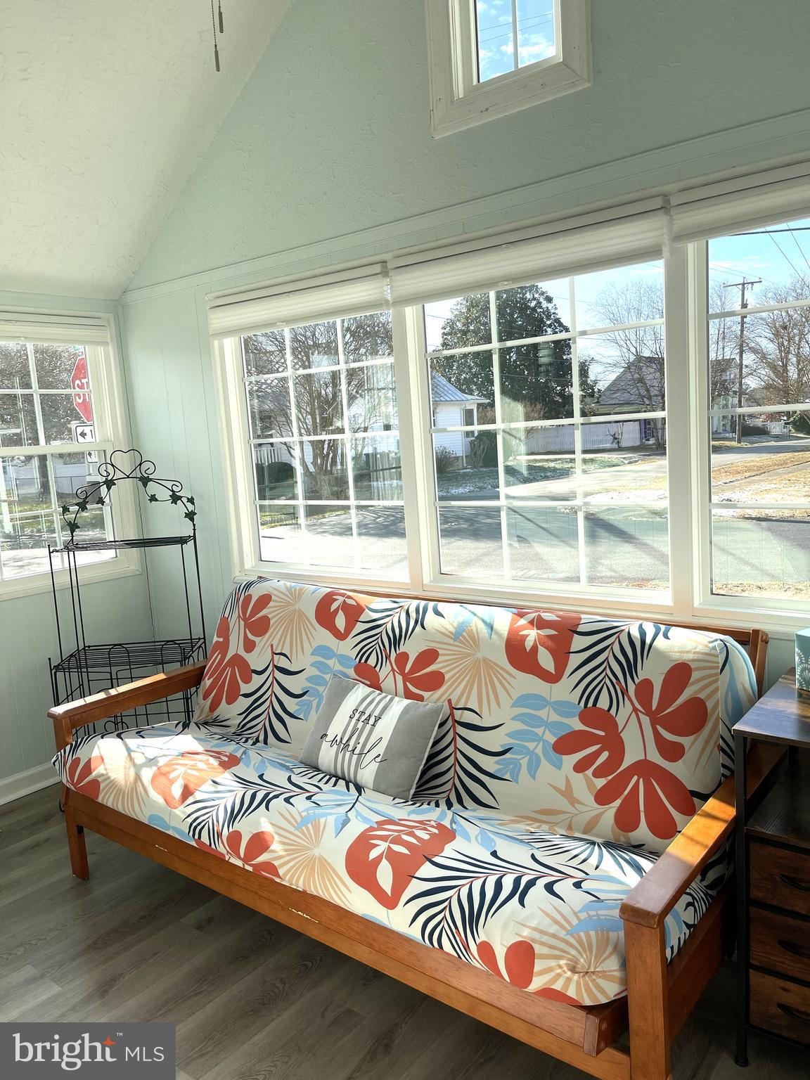 221 Madison Street Colonial Beach, VA 22443 - Photo 14 of 28 a bedroom with a bed and glass window