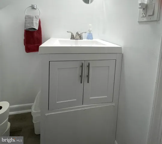 a bathroom with a sink and a toilet