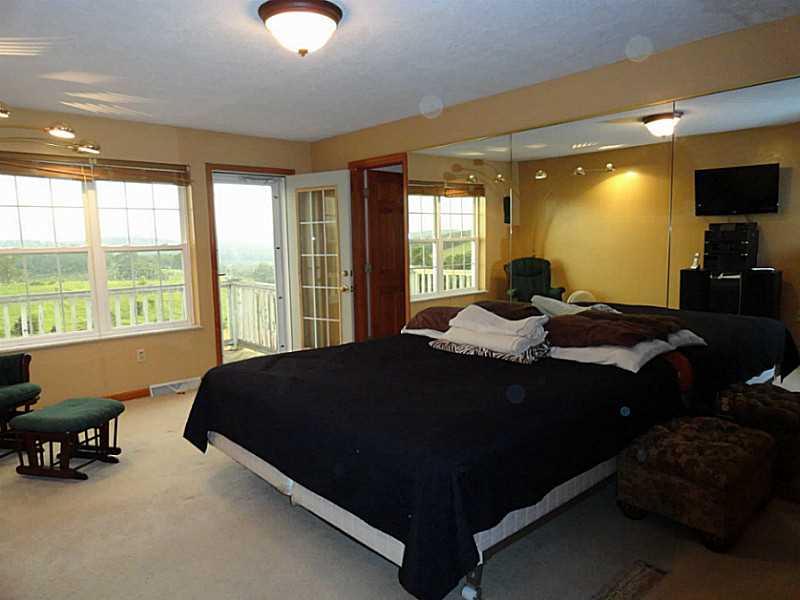 1115 Ridge Road Burgettstown, PA 15021 - Photo 14 of 25 Master Bedroom. Owners Suite with full bath, Walk-In-Closet and Deck!