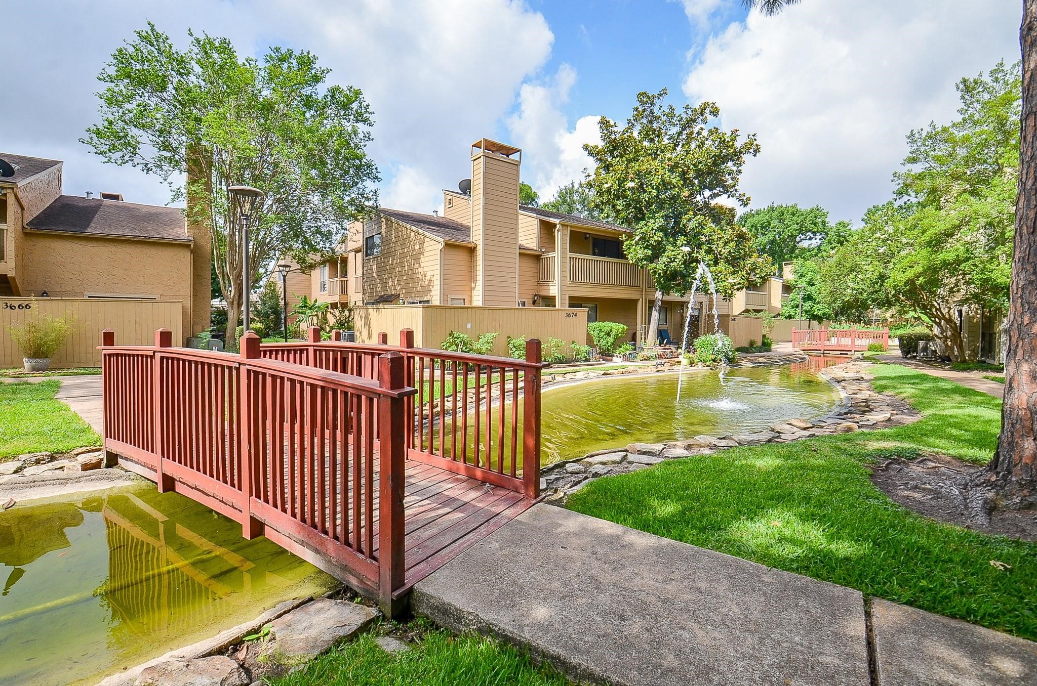 3632 Ocee Street Houston, TX 77063 - Photo 14 of 17 a view of a house with backyard and sitting area