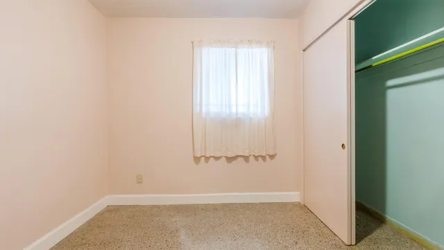a large bathroom with a tub and shower