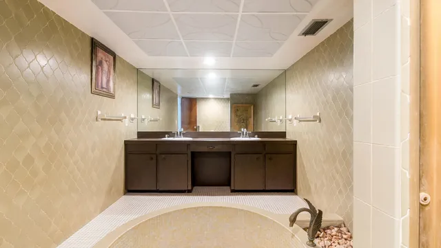 a bathroom with a toilet and a bathtub
