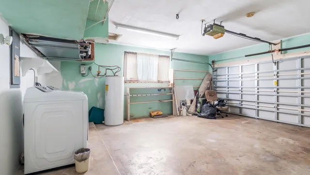 a bathroom with a sink a toilet and bathtub