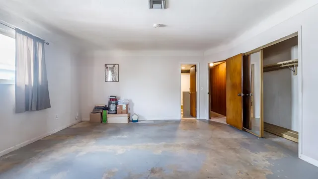 a view of a yard with trees