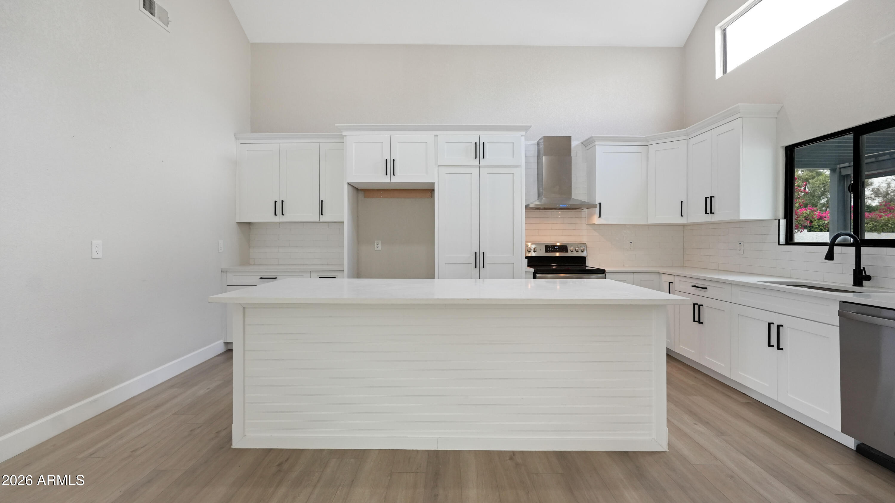1960 East Krista Way Tempe, AZ 85284 - Photo 13 of 36 a kitchen with cabinets a sink and white appliances