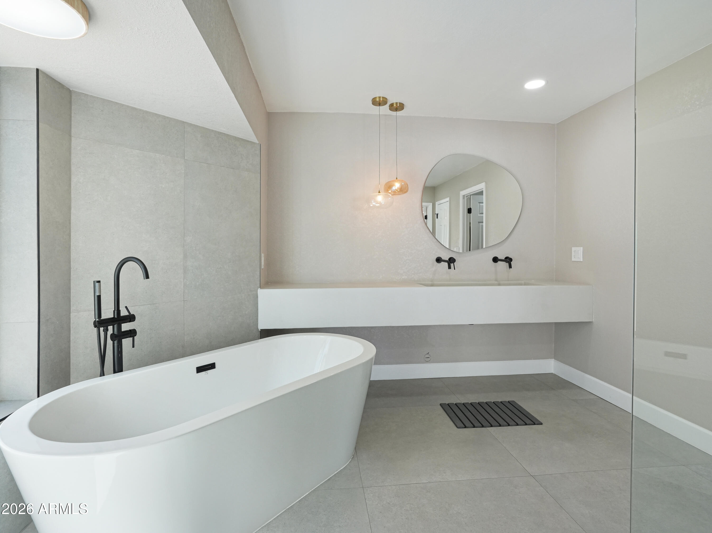 1960 East Krista Way Tempe, AZ 85284 - Photo 22 of 36 a bathroom with a tub sink and mirror