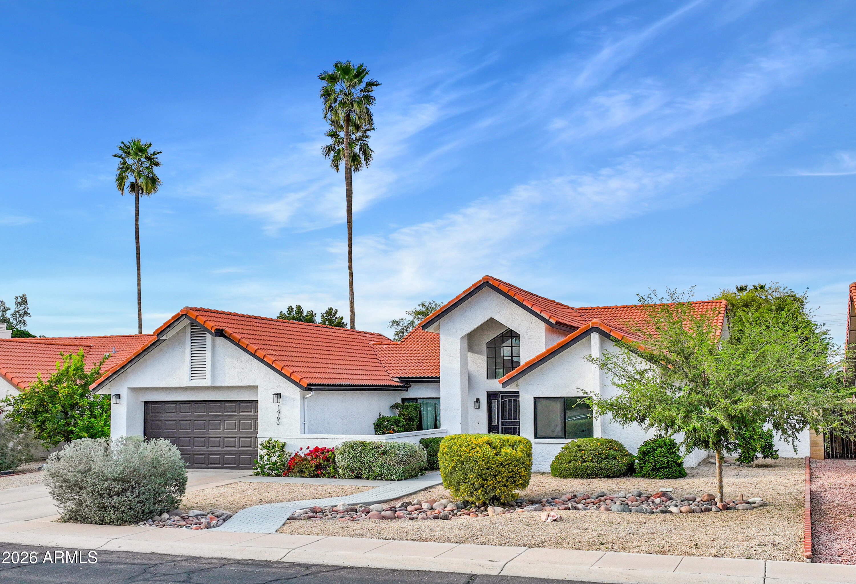 1960 East Krista Way Tempe, AZ 85284 - Photo 35 of 36 a front view of a house with a yard