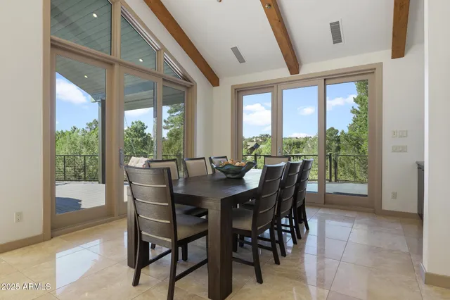 a view of a balcony with wooden floor