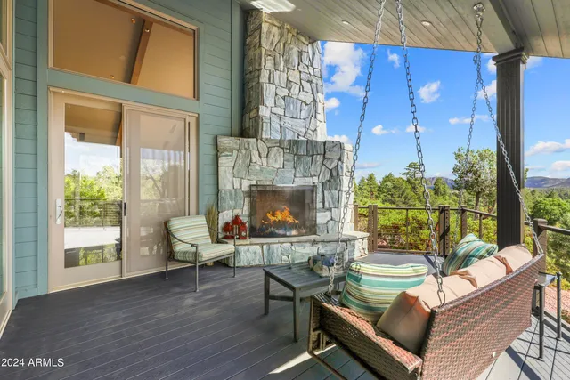 a spacious bathroom with a granite countertop sink mirror and shower