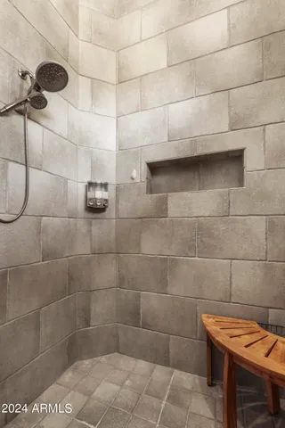 a front view of a house with a yard and a garage