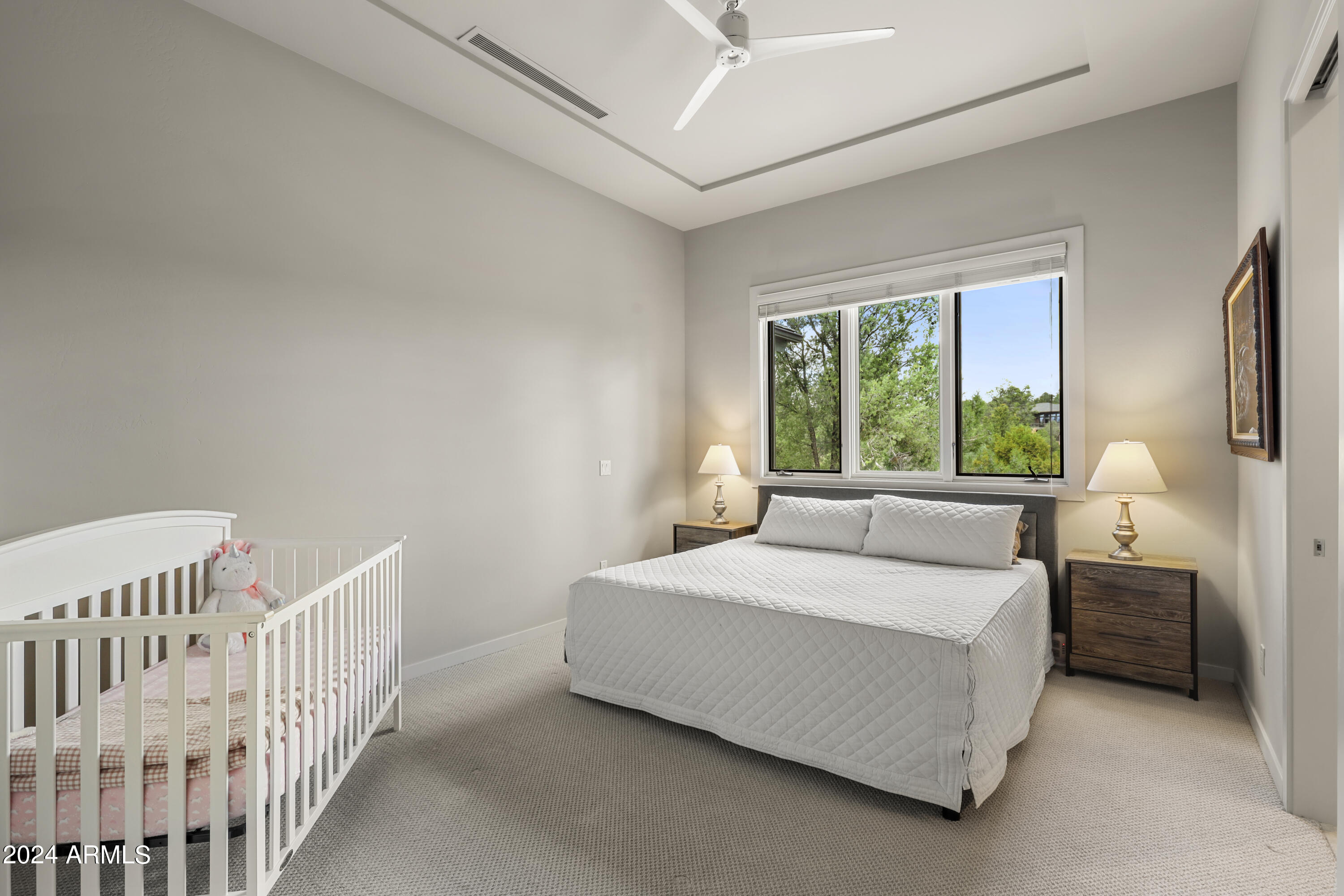 2203 East Scenic Drive Payson, AZ 85541 - Photo 38 of 74 a bedroom with a bed and a large window