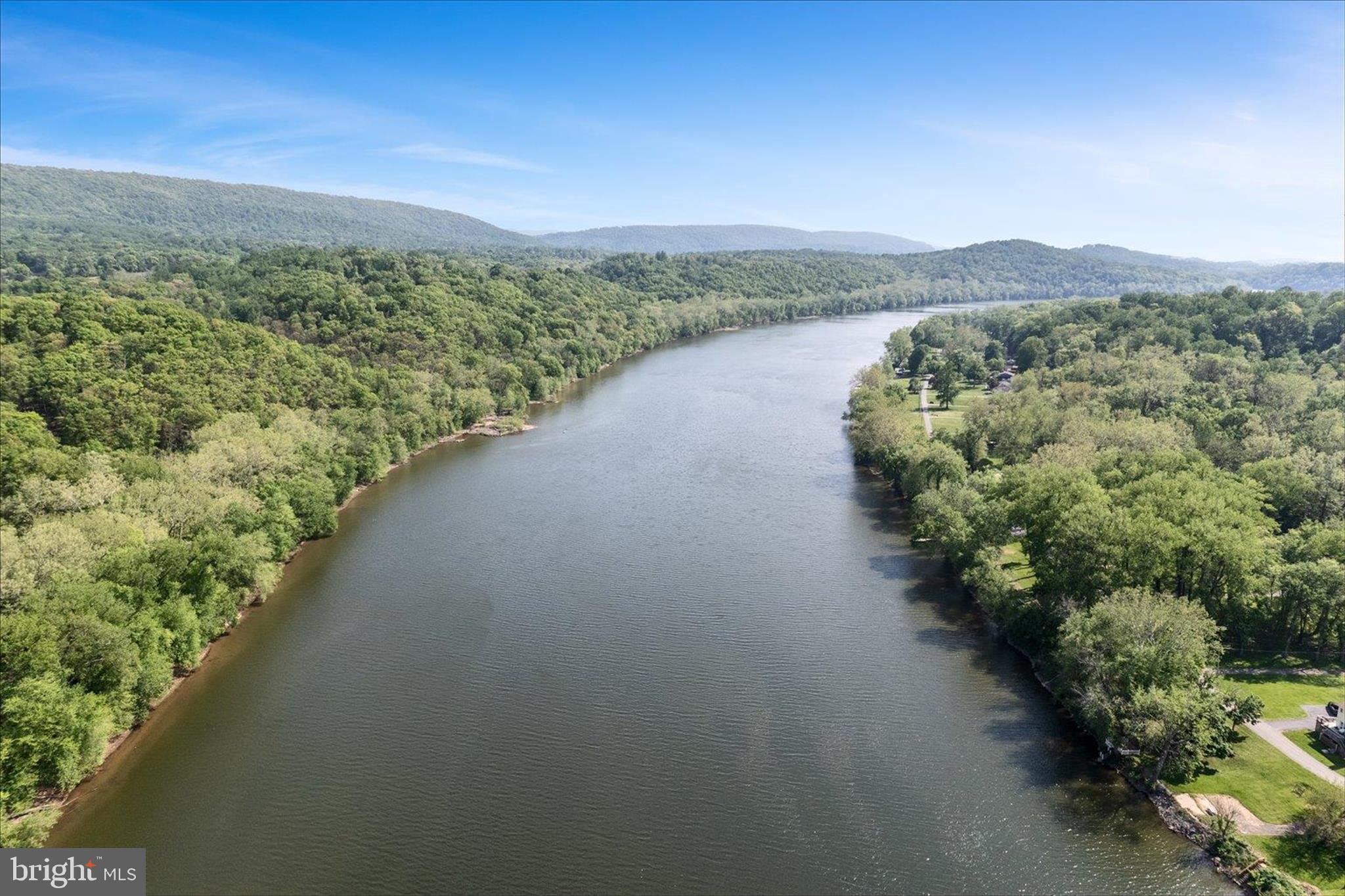 Lot 20 Hot Dog Road Falling Waters, WV 25419 - Photo 22 of 26 a view of a lake with a mountain