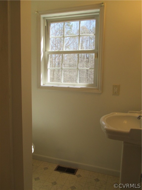 62 Falls Road Victoria, VA 23974 - Photo 28 of 36 a bathroom with a sink and a vanity