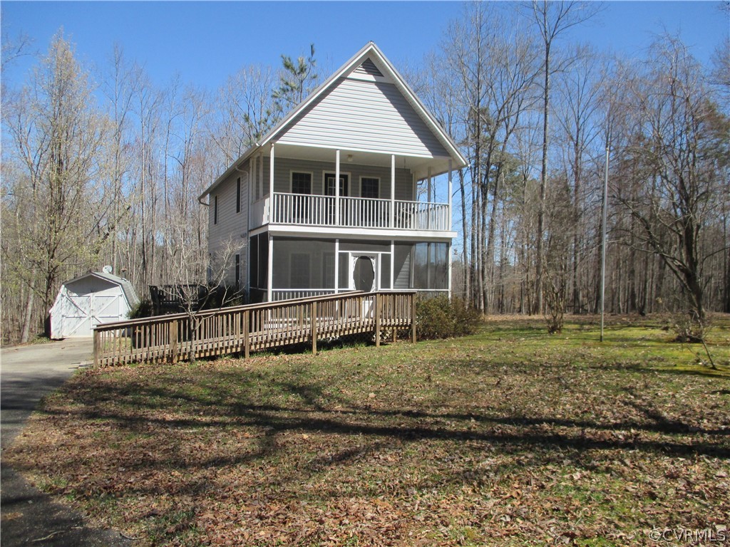 62 Falls Road Victoria, VA 23974 - Photo 3 of 36 a front view of a house with a yard