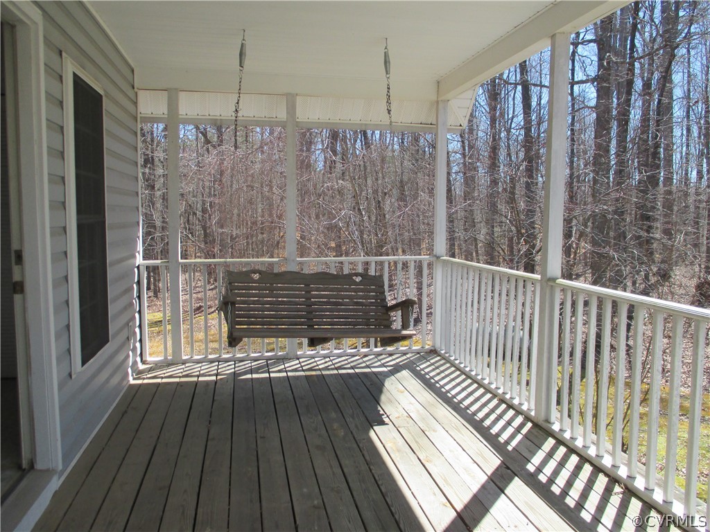 62 Falls Road Victoria, VA 23974 - Photo 31 of 36 a view of deck with wooden floor and fence