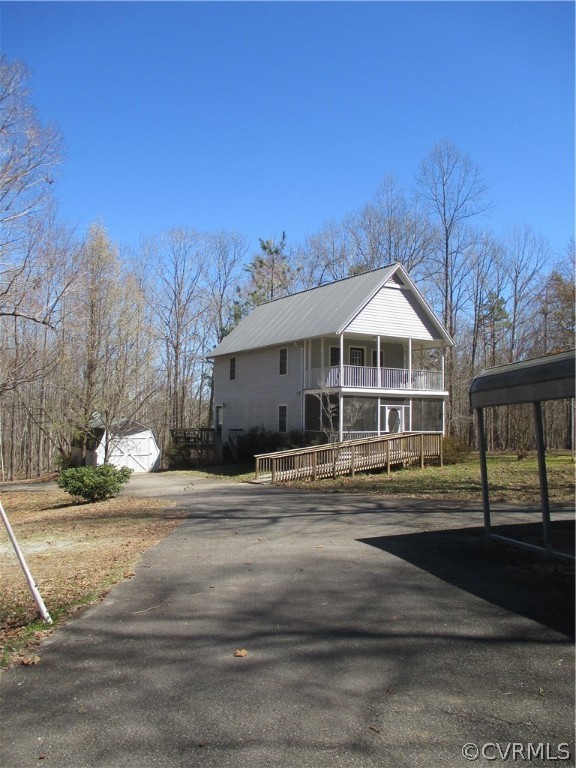62 Falls Road Victoria, VA 23974 - Photo 4 of 36 a front view of a house with a yard
