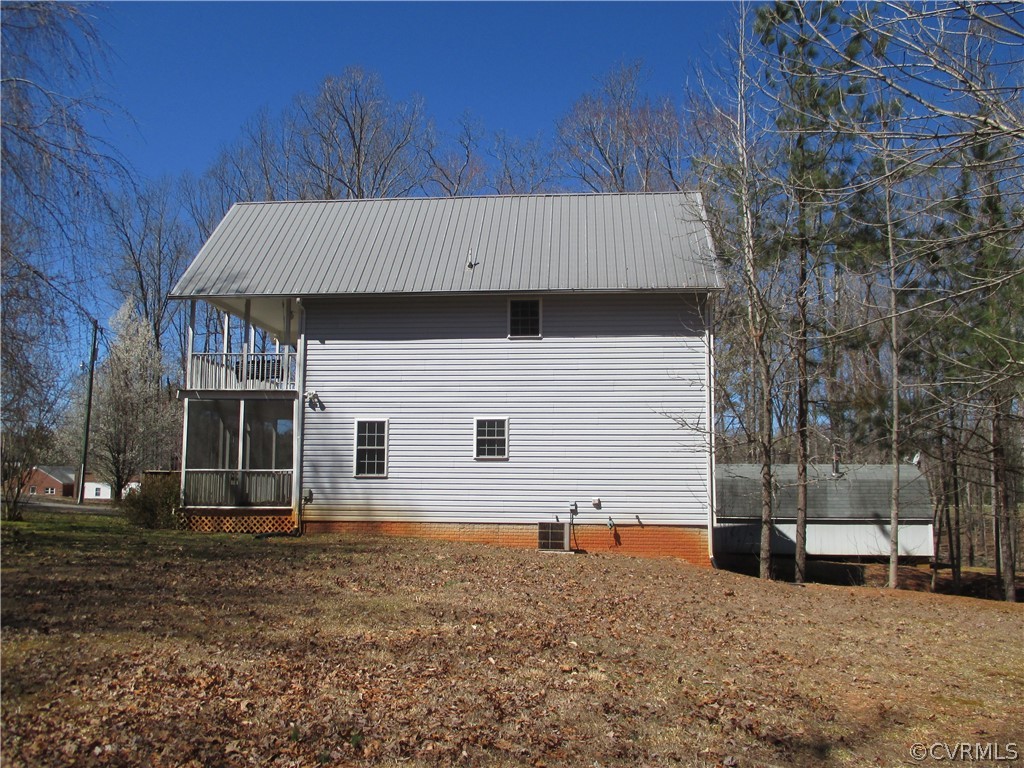 62 Falls Road Victoria, VA 23974 - Photo 10 of 36 a view of a house with a backyard