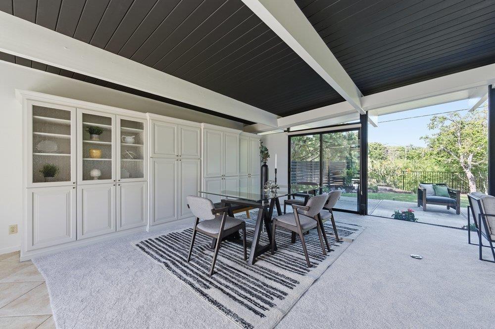 2203 Allegheny Way San Mateo, CA 94402 - Photo 10 of 56 a view of a patio with table and chairs and floor to ceiling window
