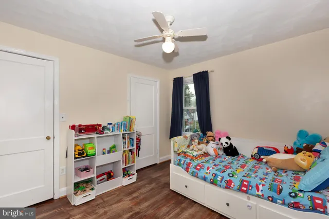 a room with toys and wooden floor