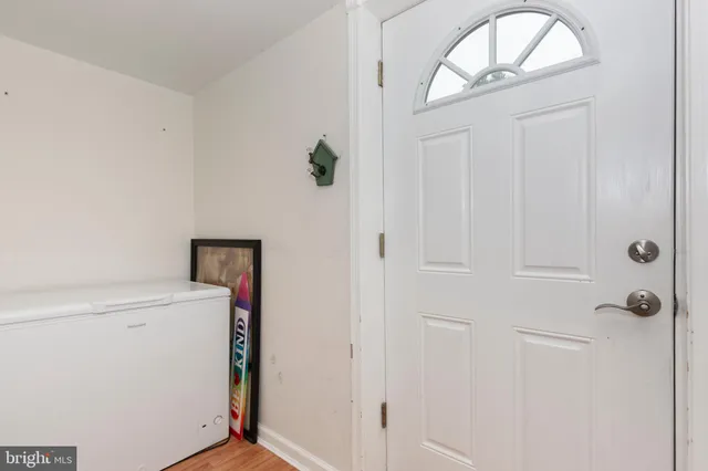a view of bathroom with washer and dryer
