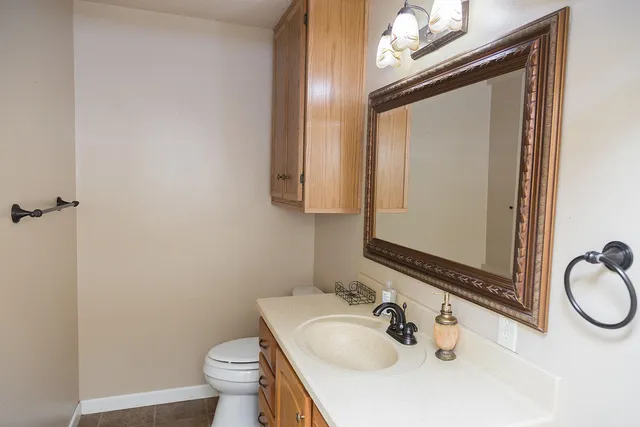 a bathroom with a sink double vanity and a mirror