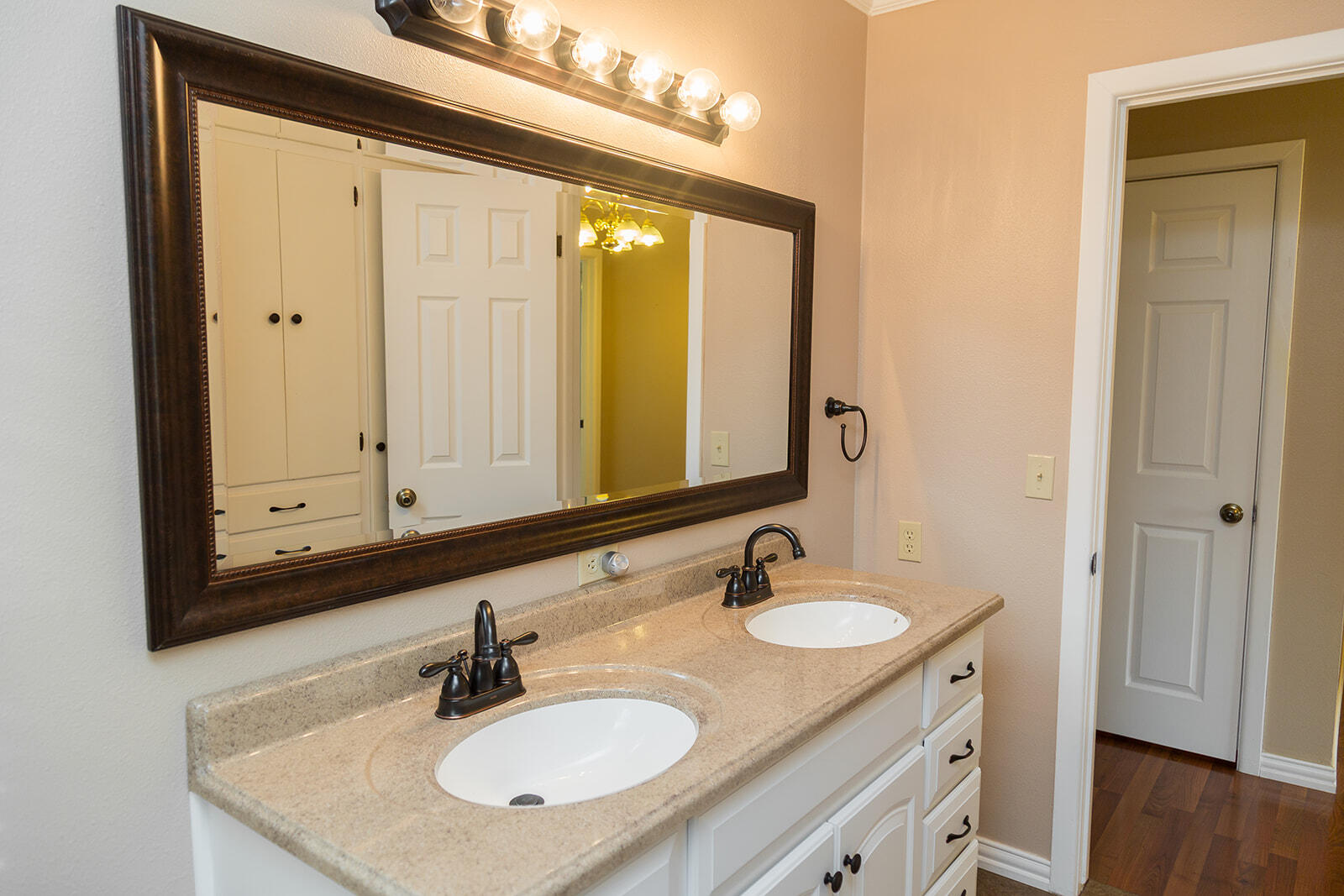 1209 Dallas Plainview, TX 79072 - Photo 39 of 57 a bathroom with a sink double vanity and a mirror