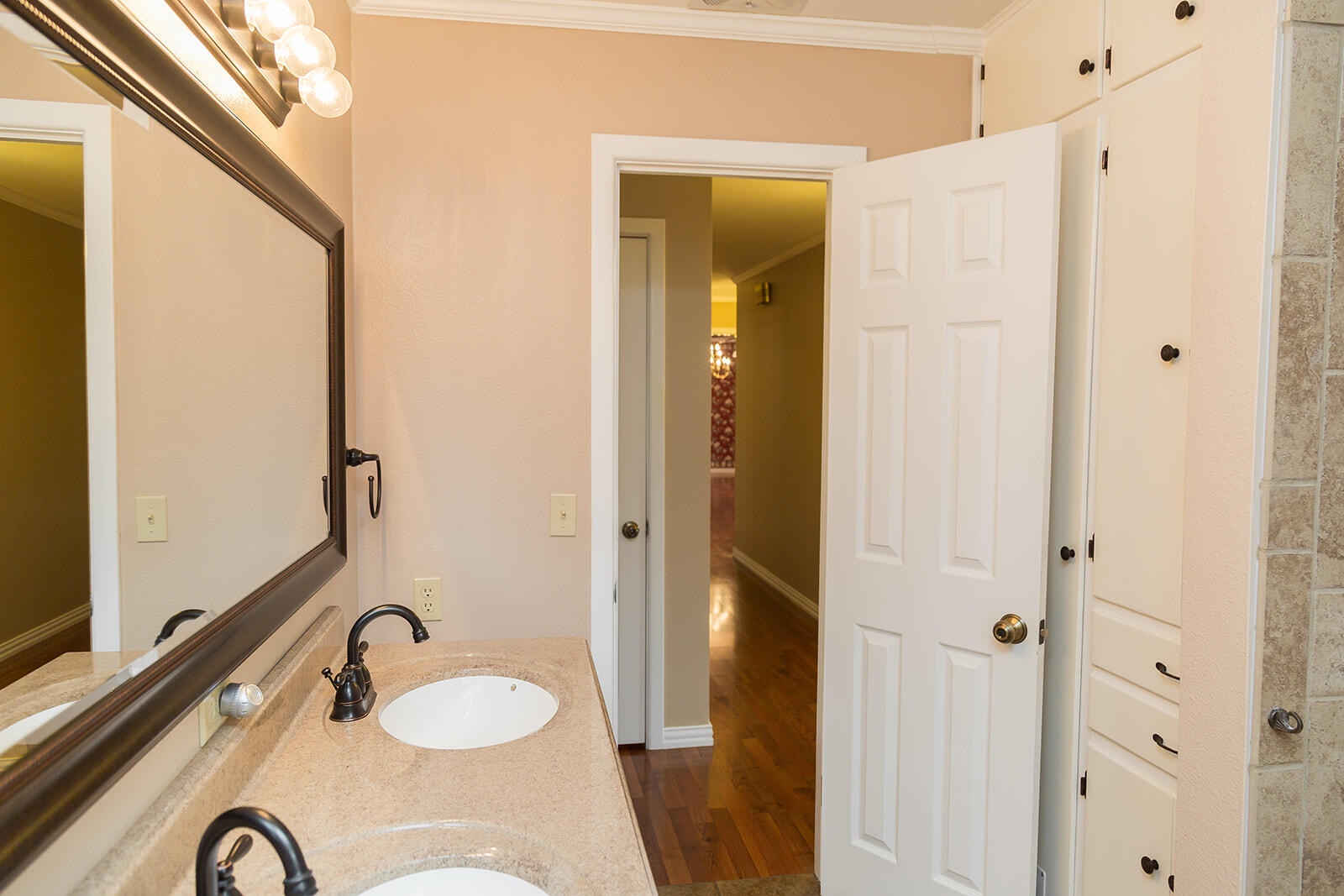 1209 Dallas Plainview, TX 79072 - Photo 41 of 57 a bathroom with a granite countertop sink and a mirror