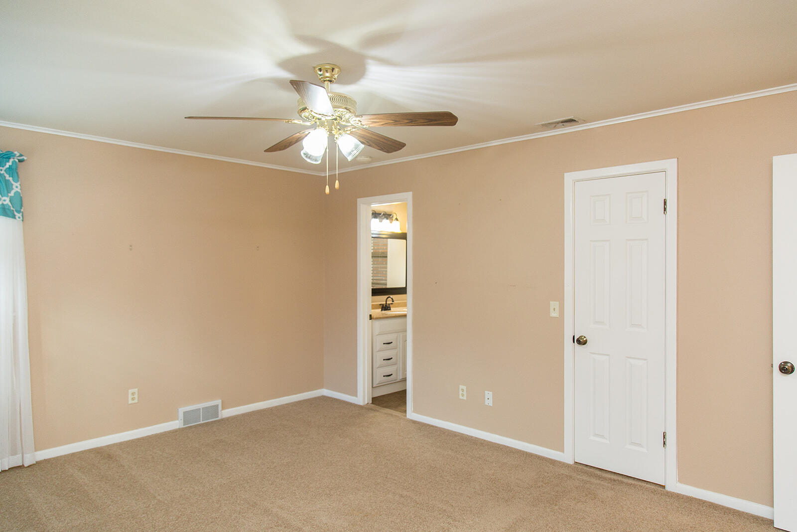 1209 Dallas Plainview, TX 79072 - Photo 43 of 57 an empty room with closet and a chandelier fan