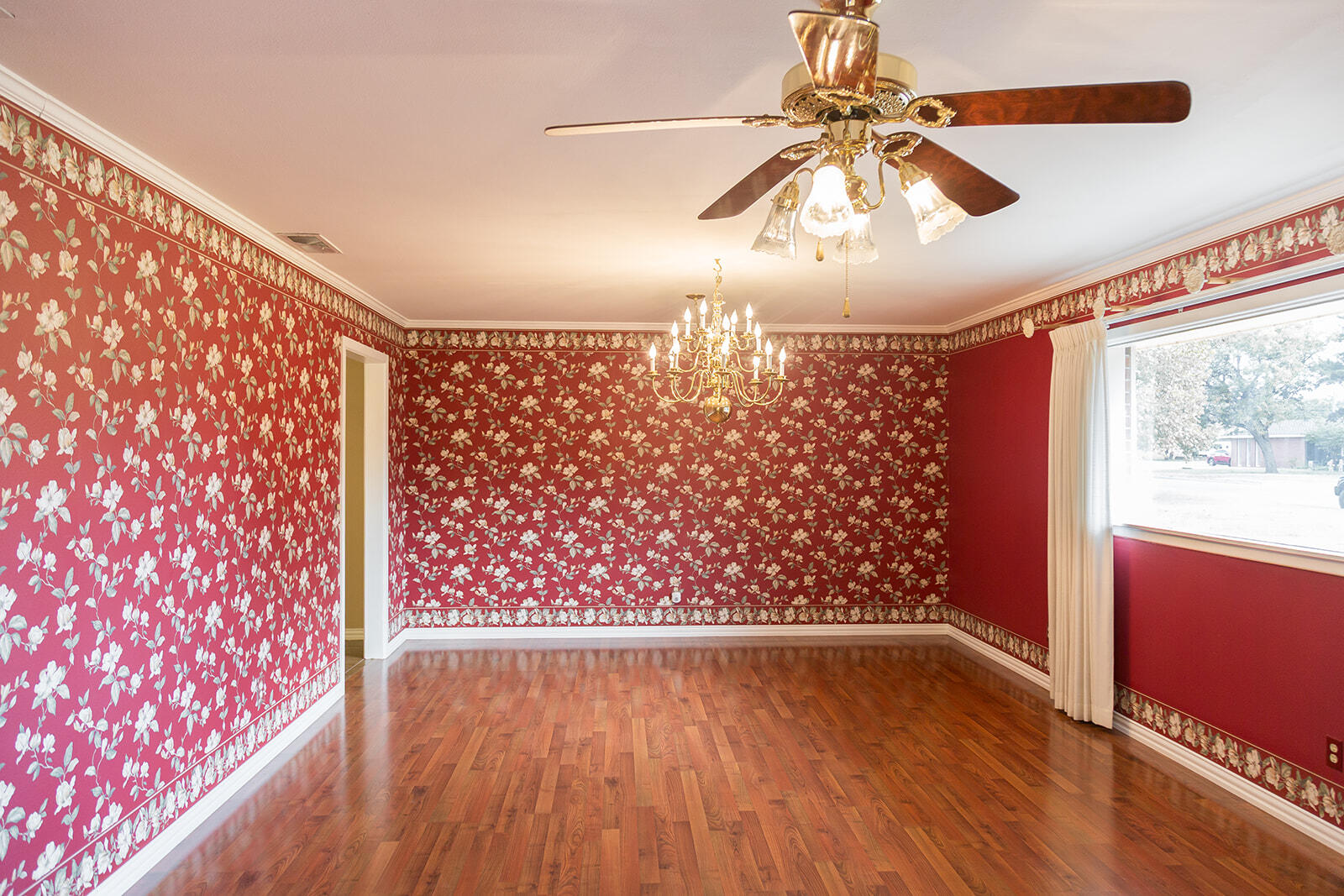 1209 Dallas Plainview, TX 79072 - Photo 7 of 57 a view of entryway with wooden floor