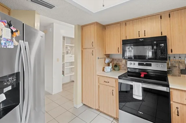 a kitchen with a sink and a window