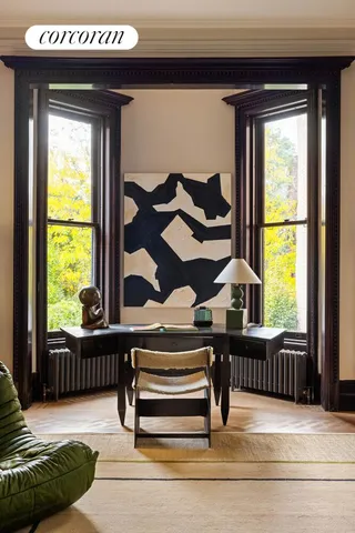 a front view of a building with garden