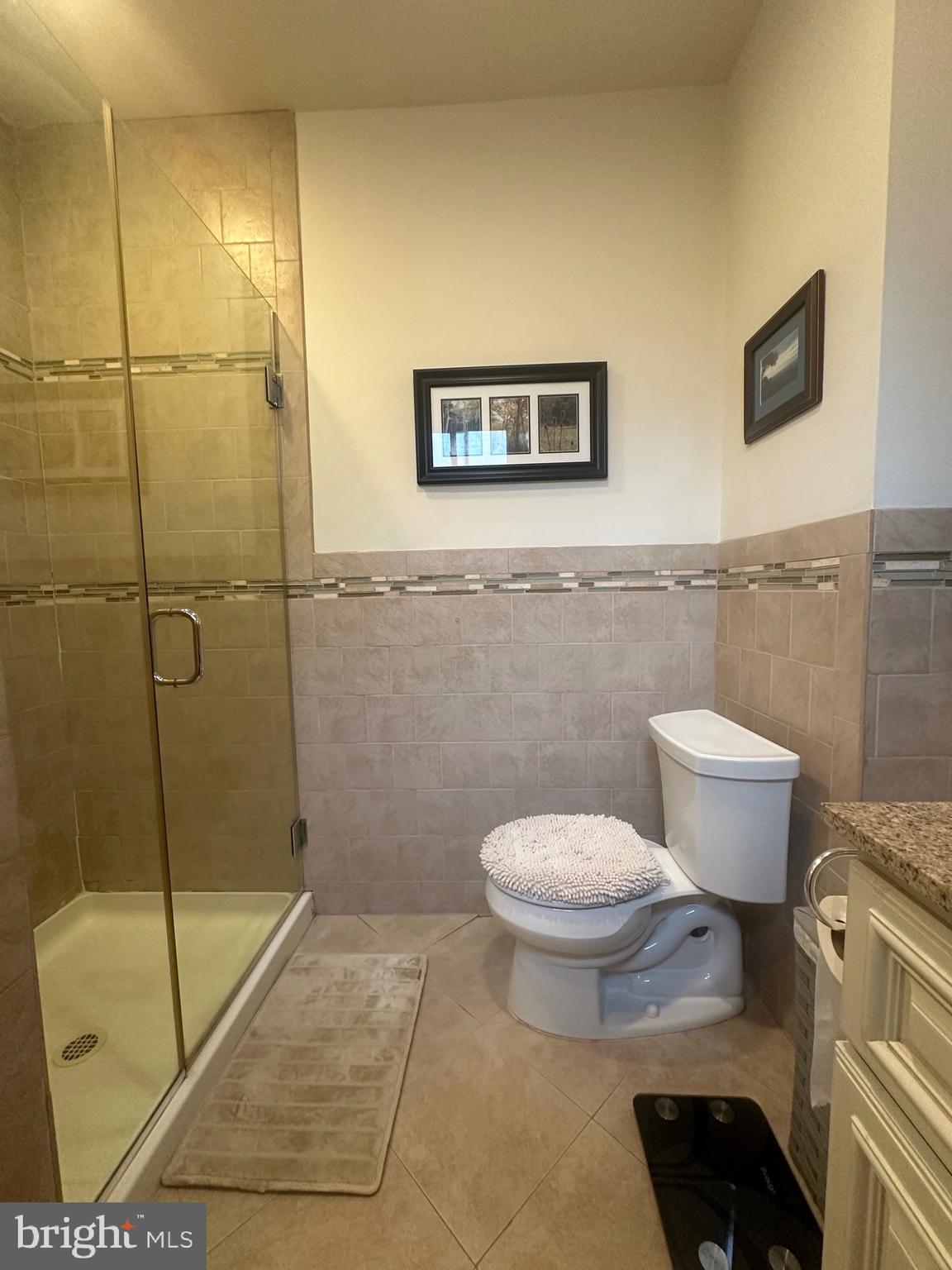 1014 Clinton Street, Unit 2R Philadelphia, PA 19107 - Photo 14 of 16 a bathroom with a toilet and a shower