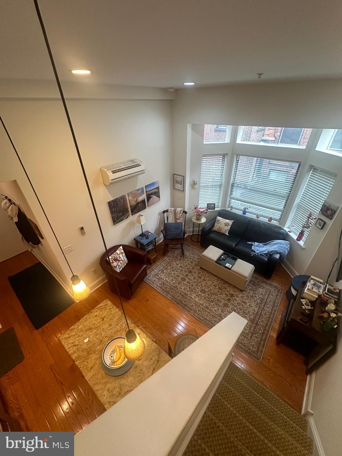 1014 Clinton Street, Unit 2R Philadelphia, PA 19107 - Photo 2 of 16 a very nice looking living room with furniture and a flat screen tv