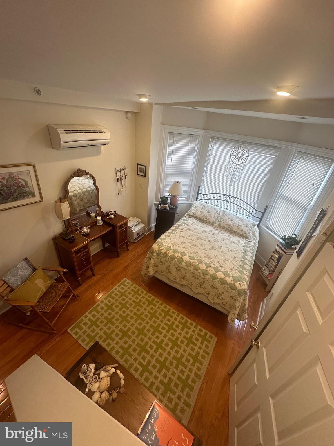 1014 Clinton Street, Unit 2R Philadelphia, PA 19107 - Photo 10 of 16 a bedroom with bed and window