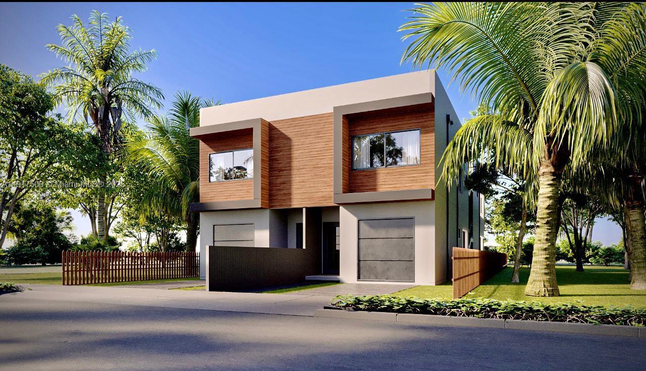 2360 Southwest 32nd Avenue, Unit RIGHT Miami, FL 33145 - Photo 2 of 9 a front view of a house with a tree