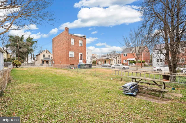 a view of a swimming pool with a lounge chair