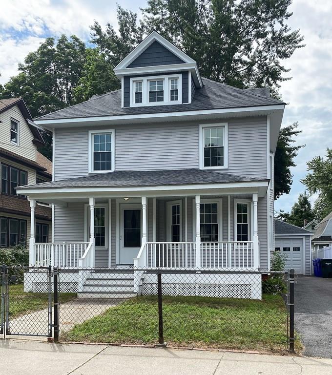 a view of front of a house with a yard