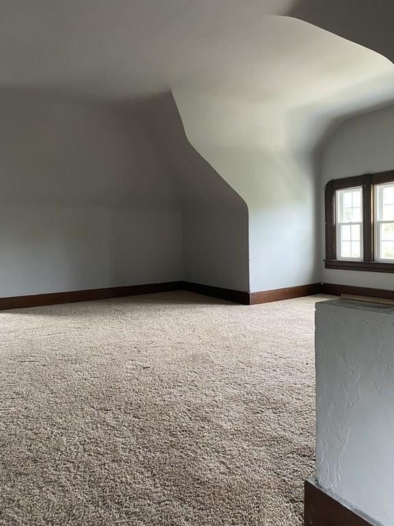 999 Sumner Avenue Springfield, MA 01118 - Photo 16 of 18 wooden floor in an empty room with a window