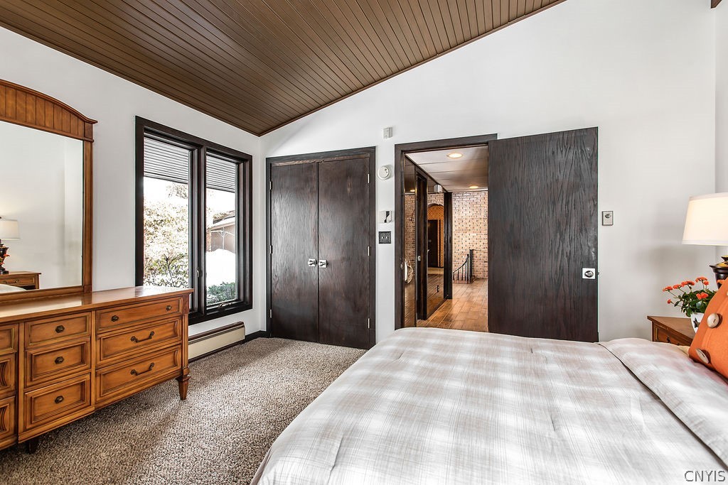 17 Quaker Hill Road DeWitt, NY 13224 - Photo 20 of 50 Guest room with large windows and closet. Vaulted