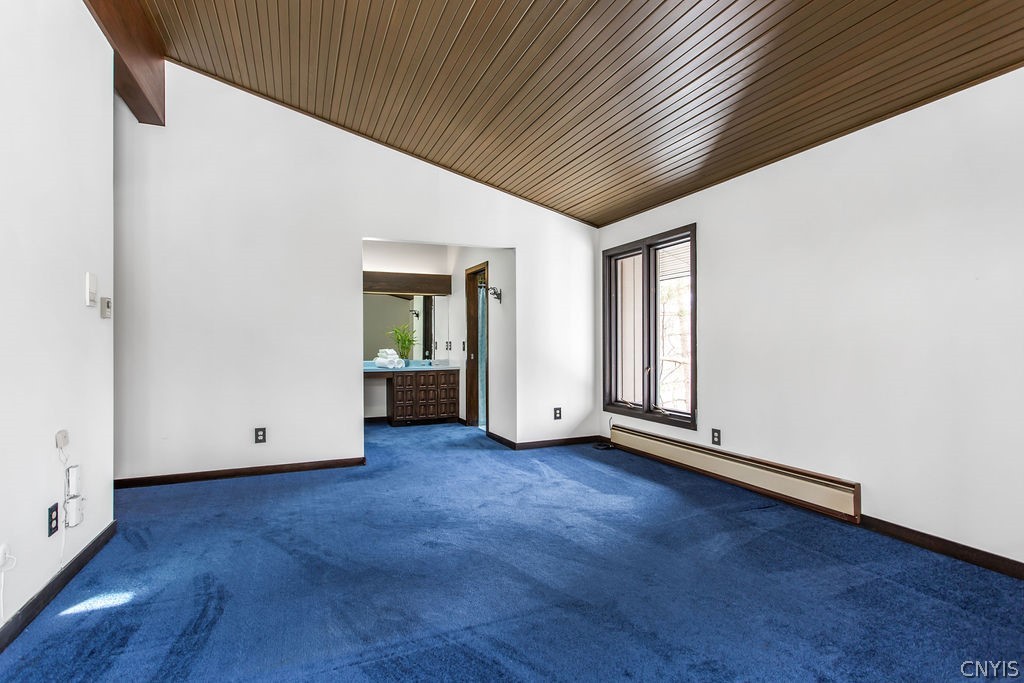 17 Quaker Hill Road DeWitt, NY 13224 - Photo 22 of 50 Owners suite with glimpse of vanity/walk in closet