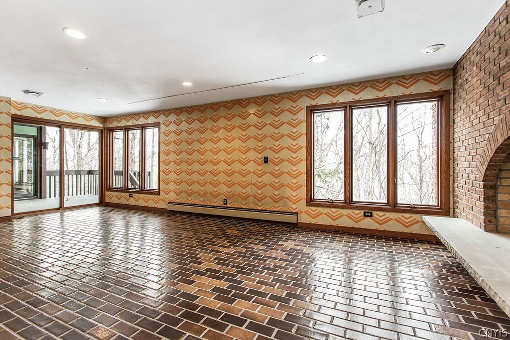 17 Quaker Hill Road DeWitt, NY 13224 - Photo 33 of 50 Lower level family room with plenty of windows to