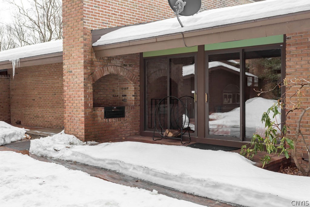 17 Quaker Hill Road DeWitt, NY 13224 - Photo 45 of 50 Access to the main level family room and a nice bu