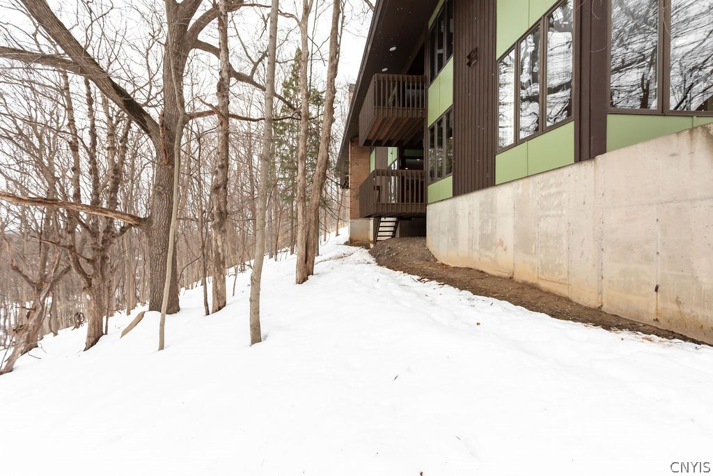 17 Quaker Hill Road DeWitt, NY 13224 - Photo 48 of 50 A glimpse of the expansive treed lot and a balcony