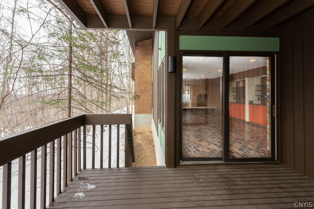 17 Quaker Hill Road DeWitt, NY 13224 - Photo 49 of 50 Lower level deck which connects the game room and