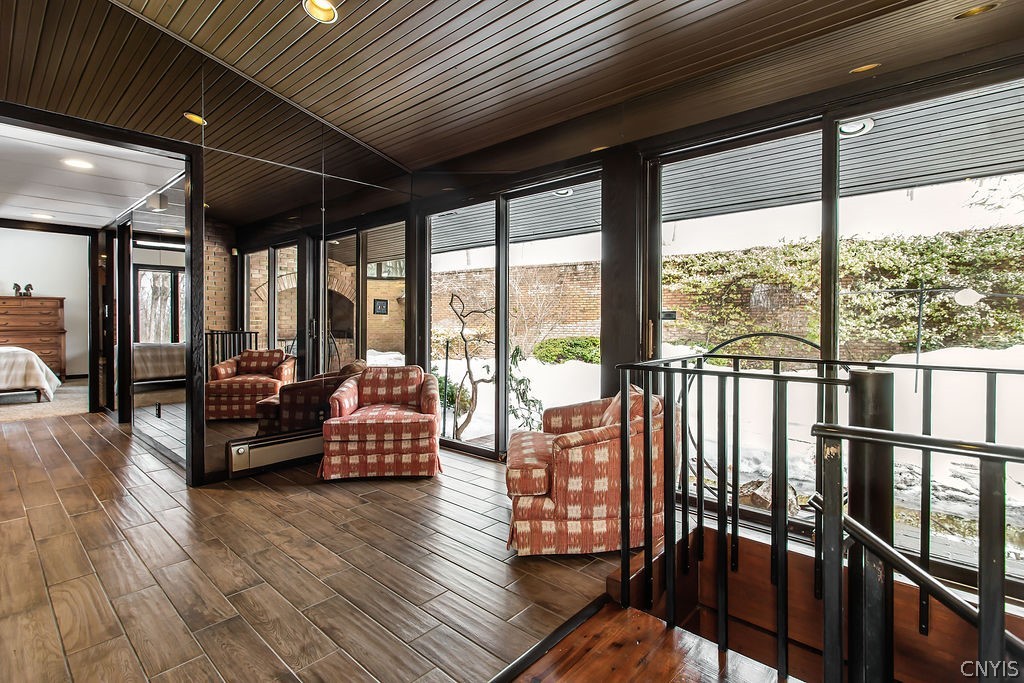 17 Quaker Hill Road DeWitt, NY 13224 - Photo 10 of 50 Additional seating area with access to the courtya