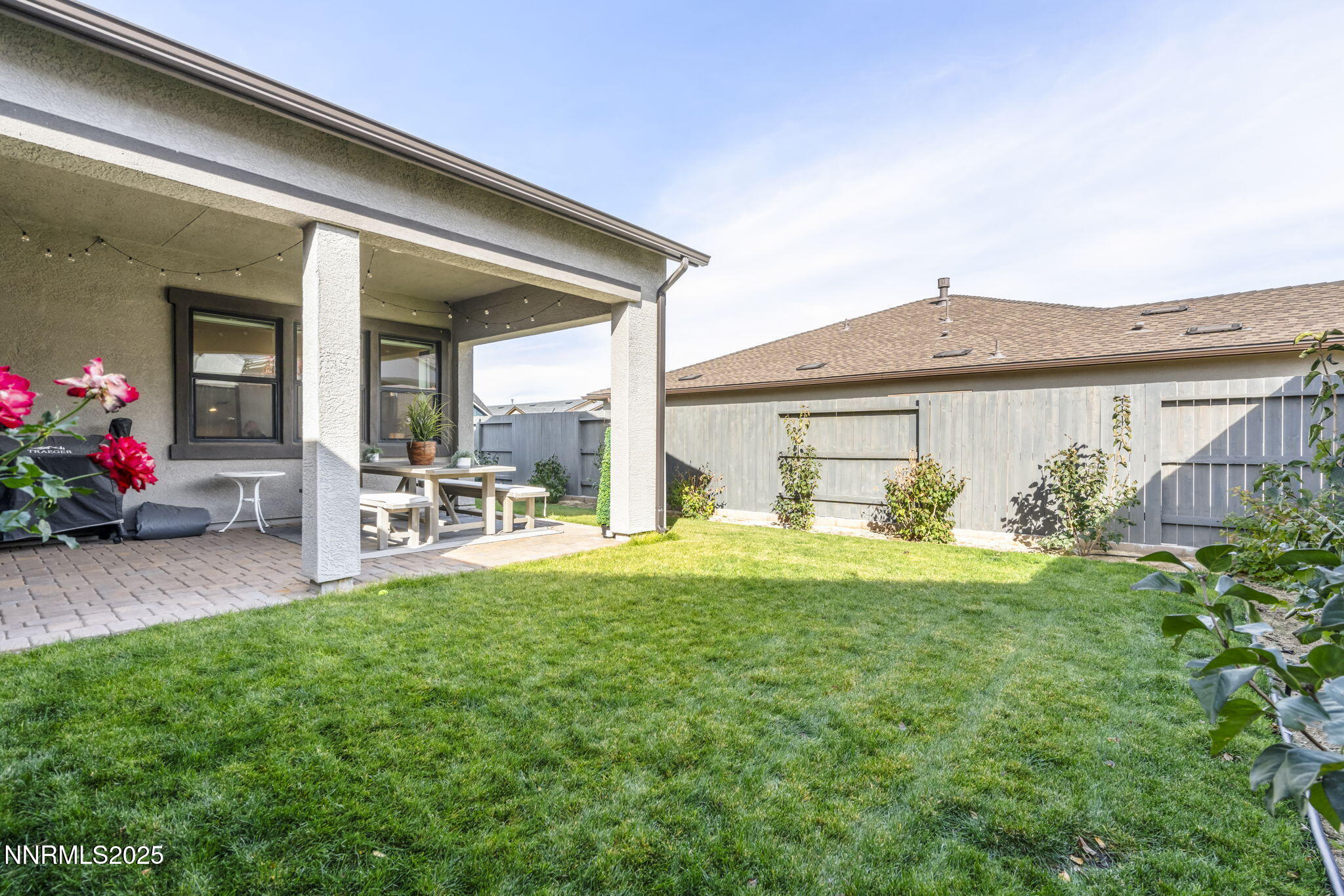 12514 Woods Clover Street Reno, NV 89521 - Photo 17 of 23 a front view of a house with garden