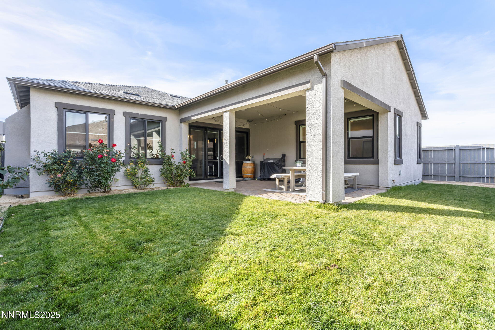12514 Woods Clover Street Reno, NV 89521 - Photo 18 of 23 a view of a house with porch and garden