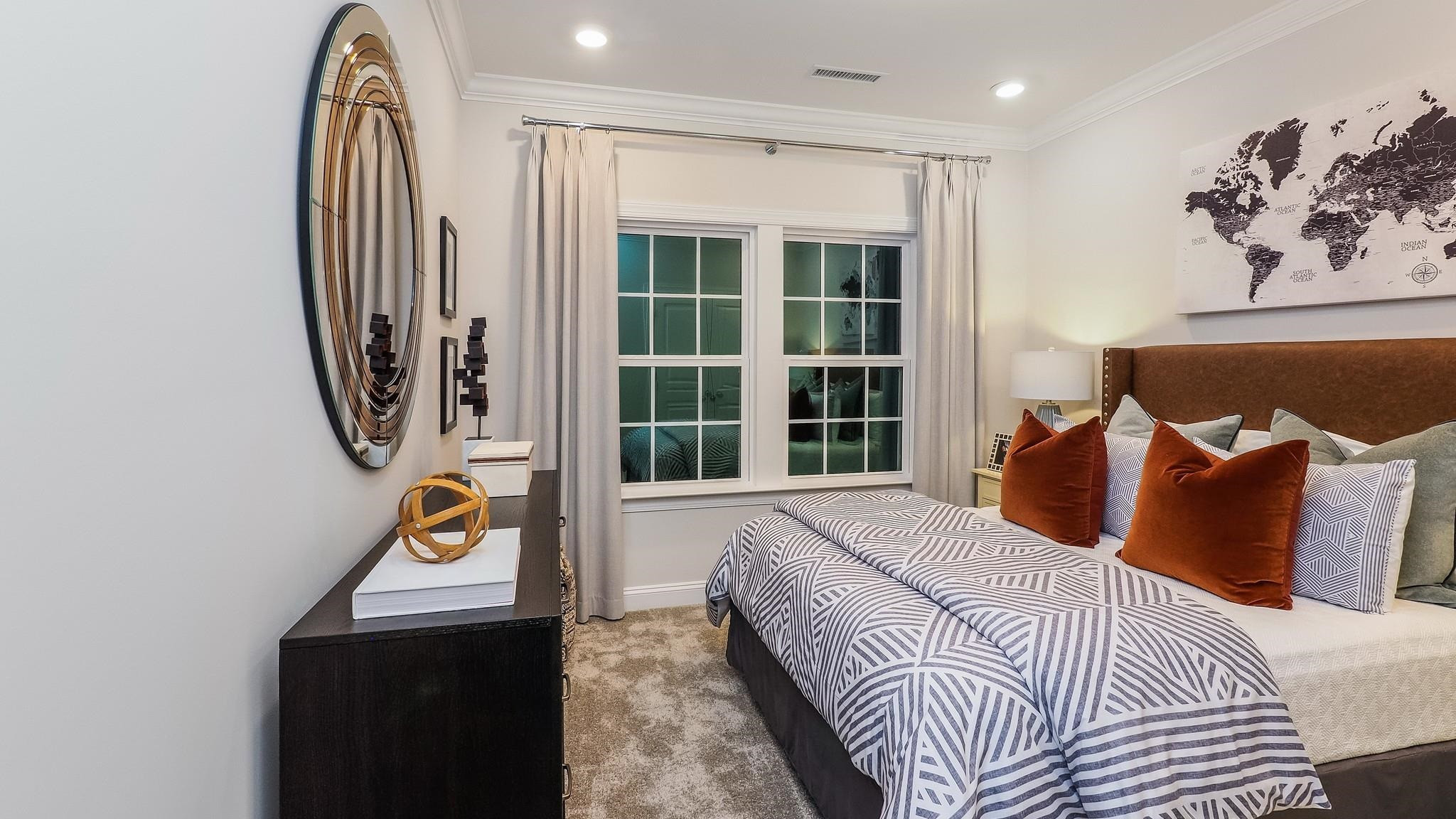 4030 Frontrunner Drive, Unit 46 Durham, NC 27703 - Photo 22 of 25 a bed room with a bed and a window