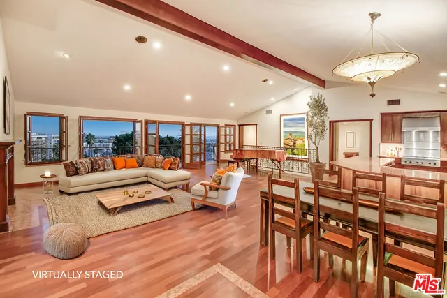 a kitchen with granite countertop lots of counter top space and dining table