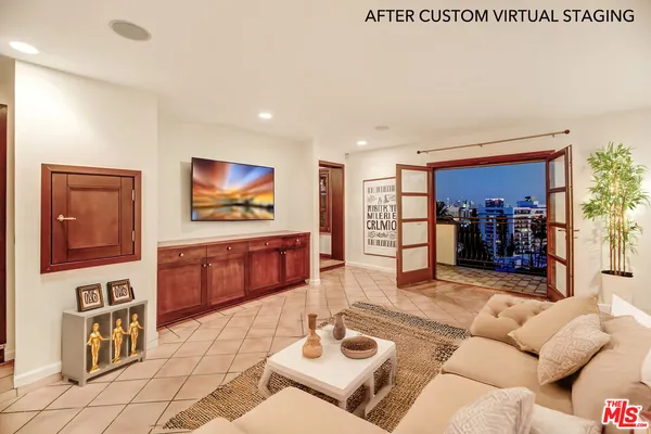 a bedroom with furniture and a fireplace